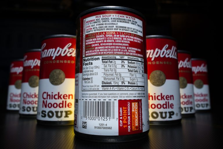 The nutrition information is shown on the back of a Campbell's Chicken Noodle soup can in Washington, Wednesday, Jan. 8, 2014. Some of the nation's largest food companies have cut their calories by the trillions according to a new study. (AP Photo/J. David Ake)