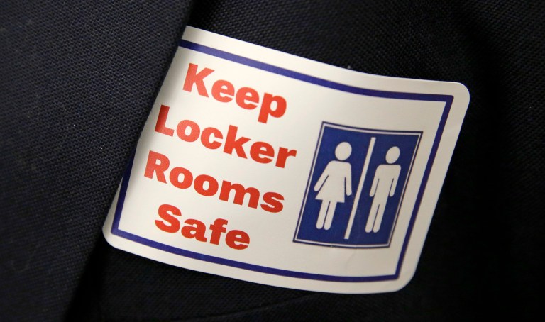 Blue has the option of using the boys' bathroom outside the classroom or a distant single-use bathroom, but she cannot use the girls' room. (AP Photo/Ted S. Warren, File)