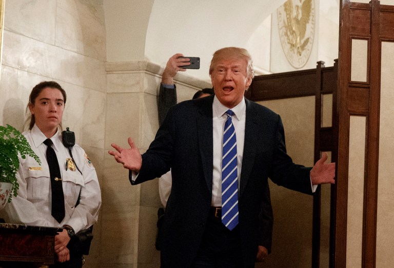 President Trump greets visitors touring the White House. (AP Photo/Evan Vucci)