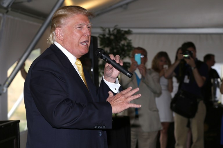 Donald Trump dismissed criticism of his hands, most notably from GOP opponent Marco Rubio, during the Republican debate in Detroit, Mich. in early March. (Photo by Greg Allen/Invision/AP)