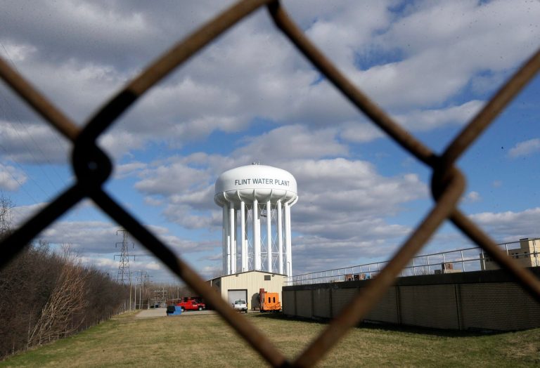 A 116-page report said Mich. officials caused the lead-contamination crisis and then bungled their response. (AP Photo/Carlos Osorio)