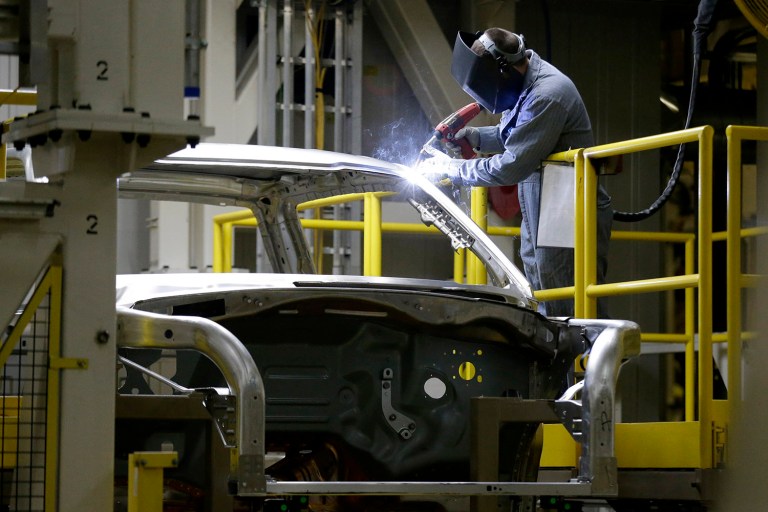 Taking into account the faster economic growth, the nonpartisan agency calculated that Obama's plans would reduce federal deficits by $2.4 trillion over the next 10 years, relative to current baseline projections for $9.2 trillion deficits in total. (AP Photo/Charlie Riedel, File)