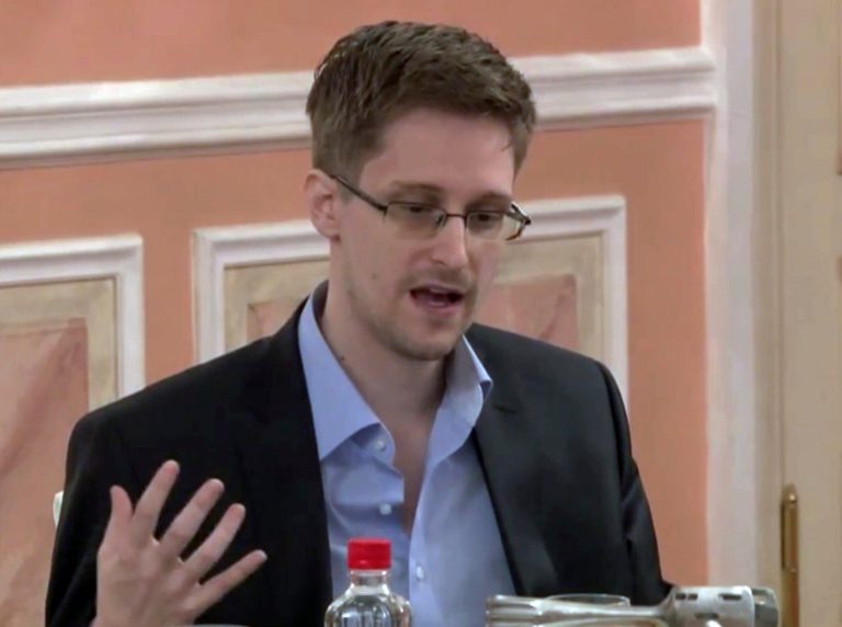Former National Security Agency systems analyst Edward Snowden speaks during a presentation ceremony for the Sam Adams Award in Moscow, Russia. (AP Photo)