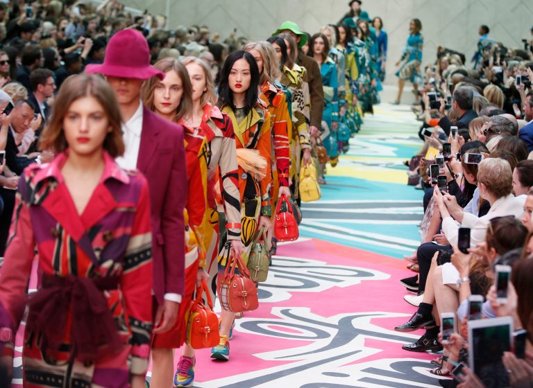 Models wear an outfits by designer Burberry Prorsum during their Spring/Summer 15 show at London Fashion Week in London, Monday, Sept. 15, 2014. (AP Photo/Alastair Grant)