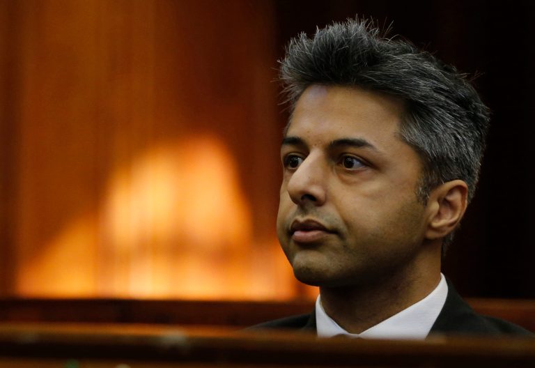 File In this Monday, Oct. 6, 2014 file photo British businessman Shrien Dewani appears in the high court in Cape Town,  South Africa, on charges of orchestrating the killing of his wife Anni Dewani, while on honeymoon in the country four years ago. The man convicted for the murder of a woman killed on honeymoon in Cape Town has died, announced South Africa's Department of Correctional Services on Saturday, Oct. 18, 2014. Xolile Mngeni, who was convicted for the murder in 2010 of Anni Dewani, died in a hospital unit of a Cape Town prison. (AP Photo/Mike Hutchings, Pool, File)