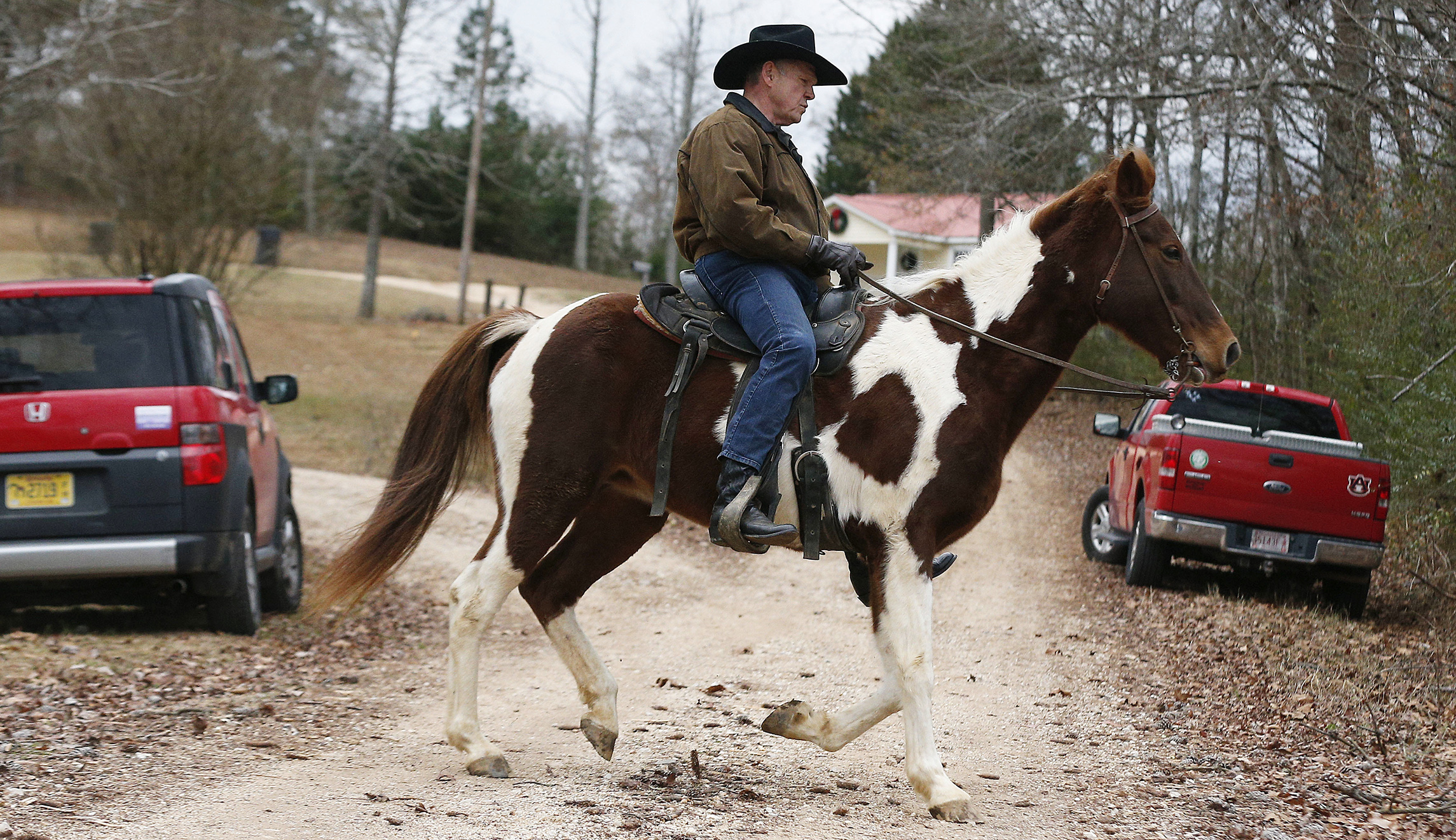 Roy Moore gallops to Alabama poll place on horseback: Watch