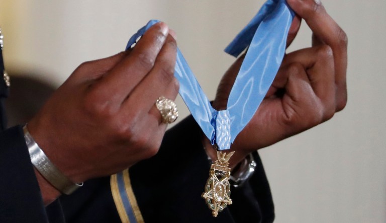 Rose served as a medic with the 5th Special Forces Group, and voluntarily risked his life several times, once even using his own body as a shield to save a wounded American from harm's way. (AP Photo/Alex Brandon)