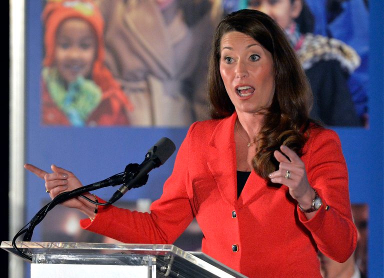 FILE - In this Feb. 25, 2014, file photo, Democratic Senatorial candidate Alison Lundergan Grimes, addresses a group of supporters at a fundraiser in Louisville, Ky. Grimes is the latest Democratic Senate candidate to call for building the Keystone XL oil pipeline. But the move hasn't cost her support among some environmentalists as she tries to win the seat now held by Senate Republican leader Mitch McConnell.(AP Photo/Timothy D. Easley, File)