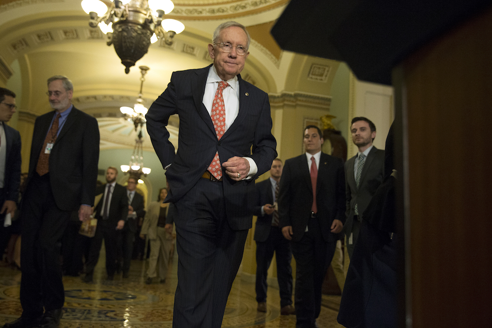 Harry Reid: Trump, McConnell are ‘cuddled up together’