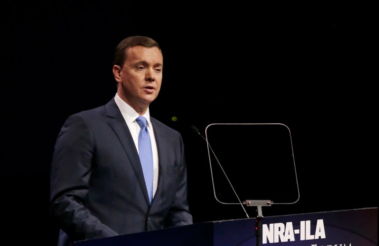 NRA chief lobbyist Chris W. Cox affirmed that Donald Trump and the group hold the same policy position on gun control. (AP Photo/Mark Humphrey)