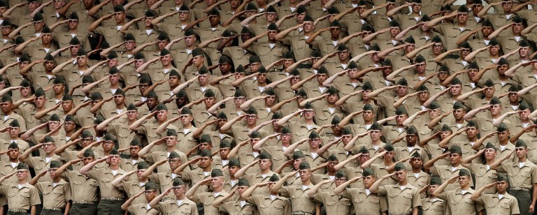 Dozens of women were identified by their rank, full name and military duty station in photos shared on a private Facebook page. (AP Photo/Gregory Bull)