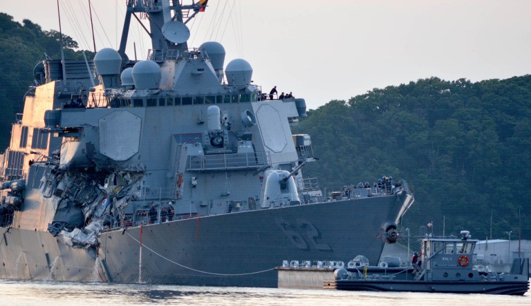 The Arleigh Burke-class guided-missile destroyer USS Fitzgerald returns to Fleet Activities Yokosuka following a collision with a merchant vessel while operating southwest of Yokosuka, Japan. (U.S. Navy photo by Mass Communication Specialist 1st Class Peter Burghart/Released)