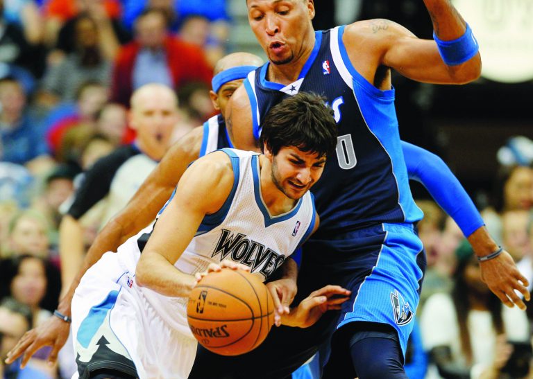Genevieve Ross/AP
The Timberwolves' Ricky Rubio finished with nine assists Saturday in his first game in nine months.