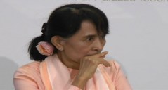 Exhausted Suu Kyi falls ill during news conference