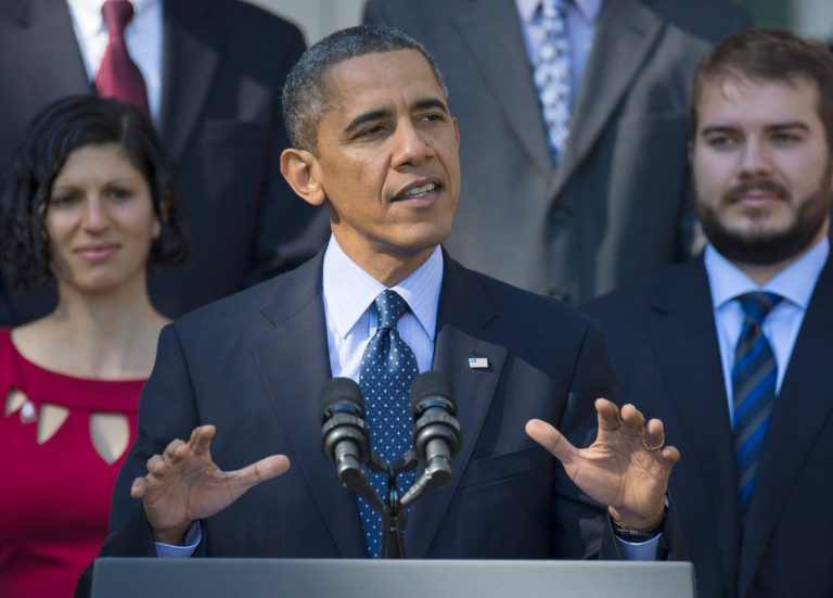 President Obama gestures while speaking in the Rose Garden of the White House on Monday on the initial rollout of the health care overhaul. (AP/ Evan Vucci)