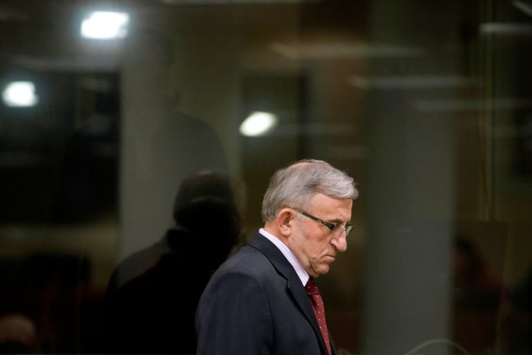 Vladimir Lazarevic enters the Yugoslav war crimes tribunal court room in The Hague Thursday Jan. 23, 2014. Nikola Sainovic, Nebojsa Pavkovic, Sreten Lukic, and Vladimir Lazarevic, four former high-ranking Yugoslav and Serbian political, military and police officials who were convicted in 2009 for crimes committed against Kosovo Albanians in 1999 during Serbiaâs deadly crackdown on ethnic Albanians appeared in court at the Yugoslav war crimes tribunal ahead of a decision in their appeal. (AP Photo/Peter Dejong, Pool)