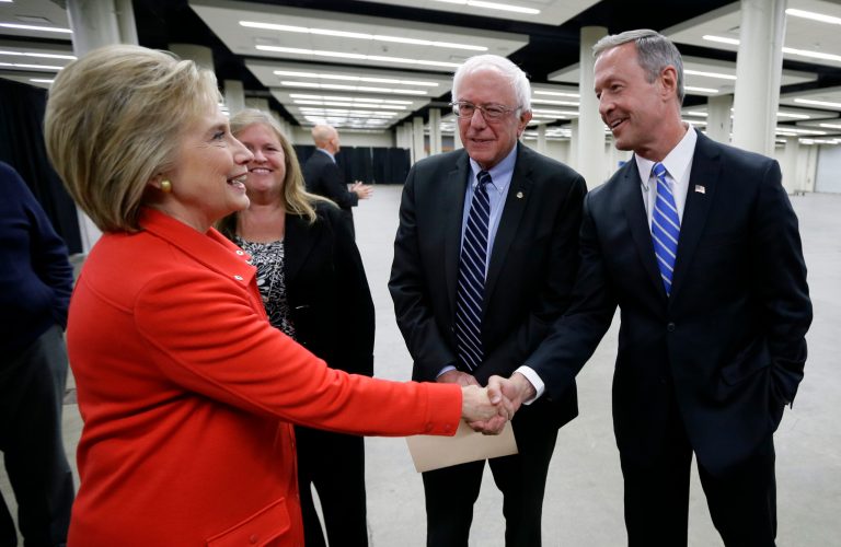 Former Maryland Gov. Martin O'Malley, right, is being careful to say he respects frontrunner Hillary Clinton, even as he tries to highlight differences between his campaign and hers. (AP Photo/Charlie Neibergall)
