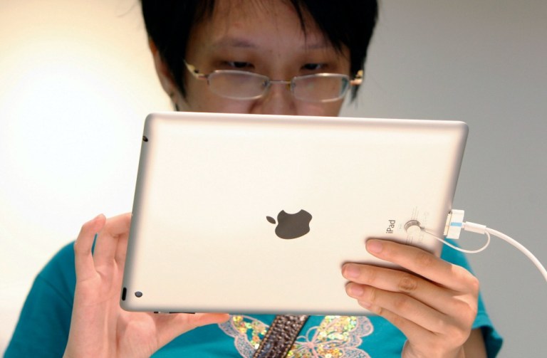 Not only will Apple be selling the technologies that drain electricity, but it will be selling the electrons to recharge them as well. (AP Photo)