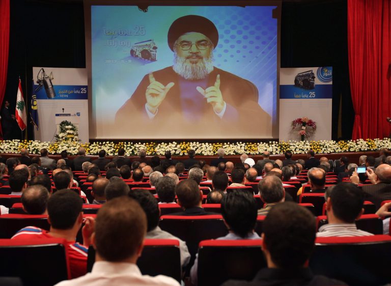 Hezbollah leader Sheik Hassan Nasrallah speaks via video during a conference, held in a southern suburb of Beirut, Lebanon, Thursday May, 9, 2013. Nasrallah said Syria will supply `game-changing' weapons to the Lebanese militant group. (AP Photo/Hussein Malla)