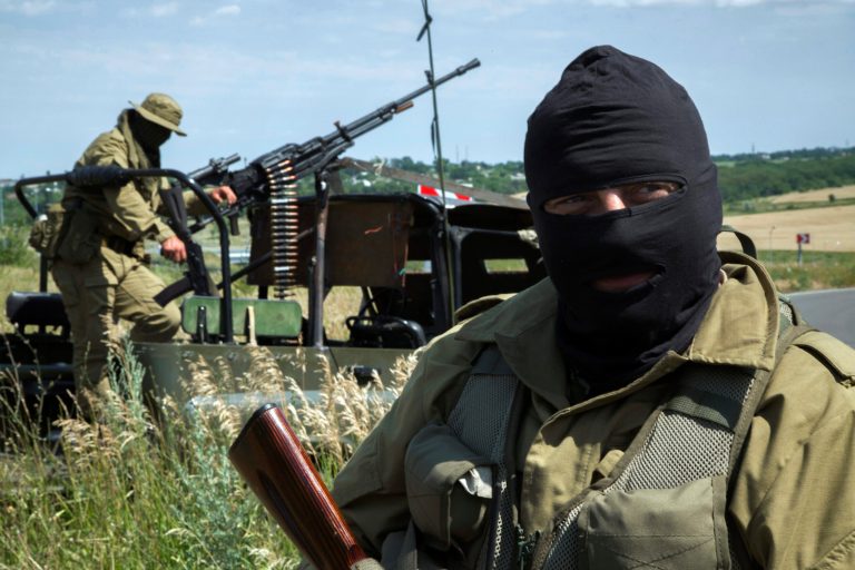 Pro-Russian fighters stand in their positions,  as they patrol the airspace near Luhansk, eastern Ukraine Wednesday, July 2, 2014. (AP Photo/Dmitry Lovetsky)
