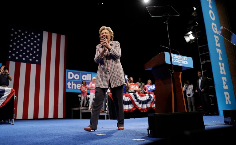 Hillary Clinton drew cheers from her supporters Friday after she mocked Donald Trump's late-night Twitter rant against former Miss Universe Alicia Machado. (AP Photo/Matt Rourke)