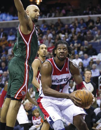 Manuel Balce Ceneta/AP
Wizards center Nene scored 14 points in Wednesday's win over the Bucks.