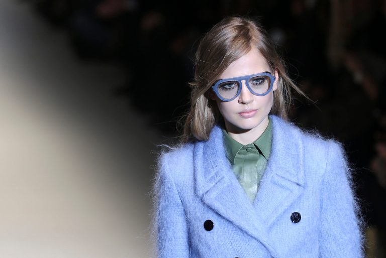 A model wears a creation for Gucci women's Fall-Winter 2014-15 collection, part of the Milan Fashion Week, unveiled in Milan, Italy, Wednesday, Feb. 19, 2014. (AP Photo/Antonio Calanni)