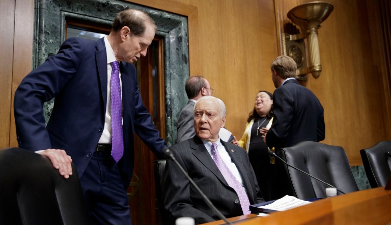 Sen. Orrin Hatch, R-Utah, (seated right) told reporters he would be in favor of extending the Children's Health Insurance Program for five years in a move sure to please Democrats and program supporters. (AP Photo/J. Scott Applewhite)