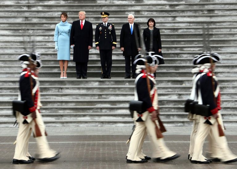President Donald Trump (2L), with (L-R) first lady Melania Trump, Maj. Gen. Bradley Becker, Vice President Mike Pence and his wife Karen Pence review troops on the East Front of the U.S. Capitol on January 20, 2017 in Washington, DC. In today's inauguration ceremony Donald J. Trump becomes the 45th president of the United States. (Photo by Michael Heiman/Getty Images)