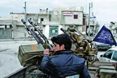 Rebels, troops battle for key Damascus highway