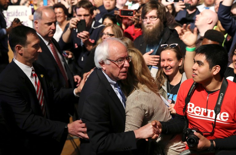 Bernie Sanders' legions of devotees are reluctant to support his rival, Hillary Clinton, despite the near-certainty of their candidate's defeat. (AP Photo/Mel Evans)