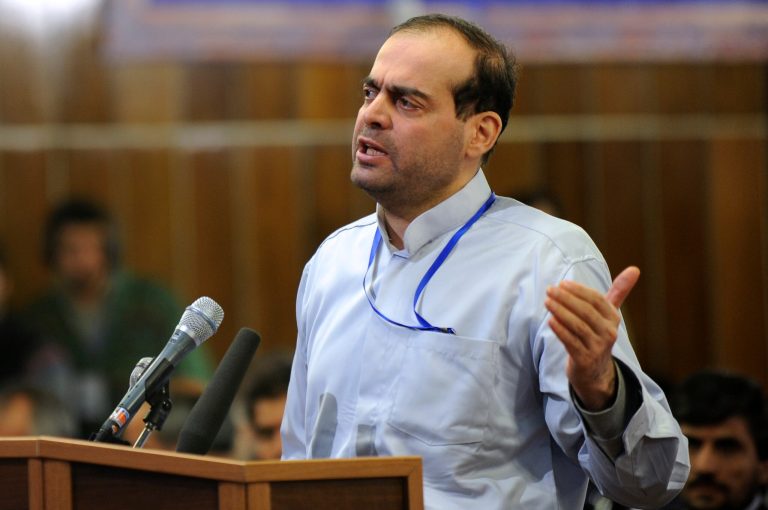 In this picture Feb. 18, 2012 photo, released by the Iranian Students News Agency, ISNA, Mahafarid Amir Khosravi speaks at his trial in a court in Tehran, Iran. Khosravi, a billionaire businessman at the heart of a $2.6 billion state bank scam, the largest fraud case since the country's 1979 Islamic Revolution, was executed Saturday, state television reported. Authorities put Mahafarid Amir Khosravi, also known as Amir Mansour Aria, to death at Evin prison, just north of the capital, Tehran, the station reported. The report said the execution came after Iran's Supreme Court upheld his death sentence. (AP Photo/ISNA, Hamid Foroutan)