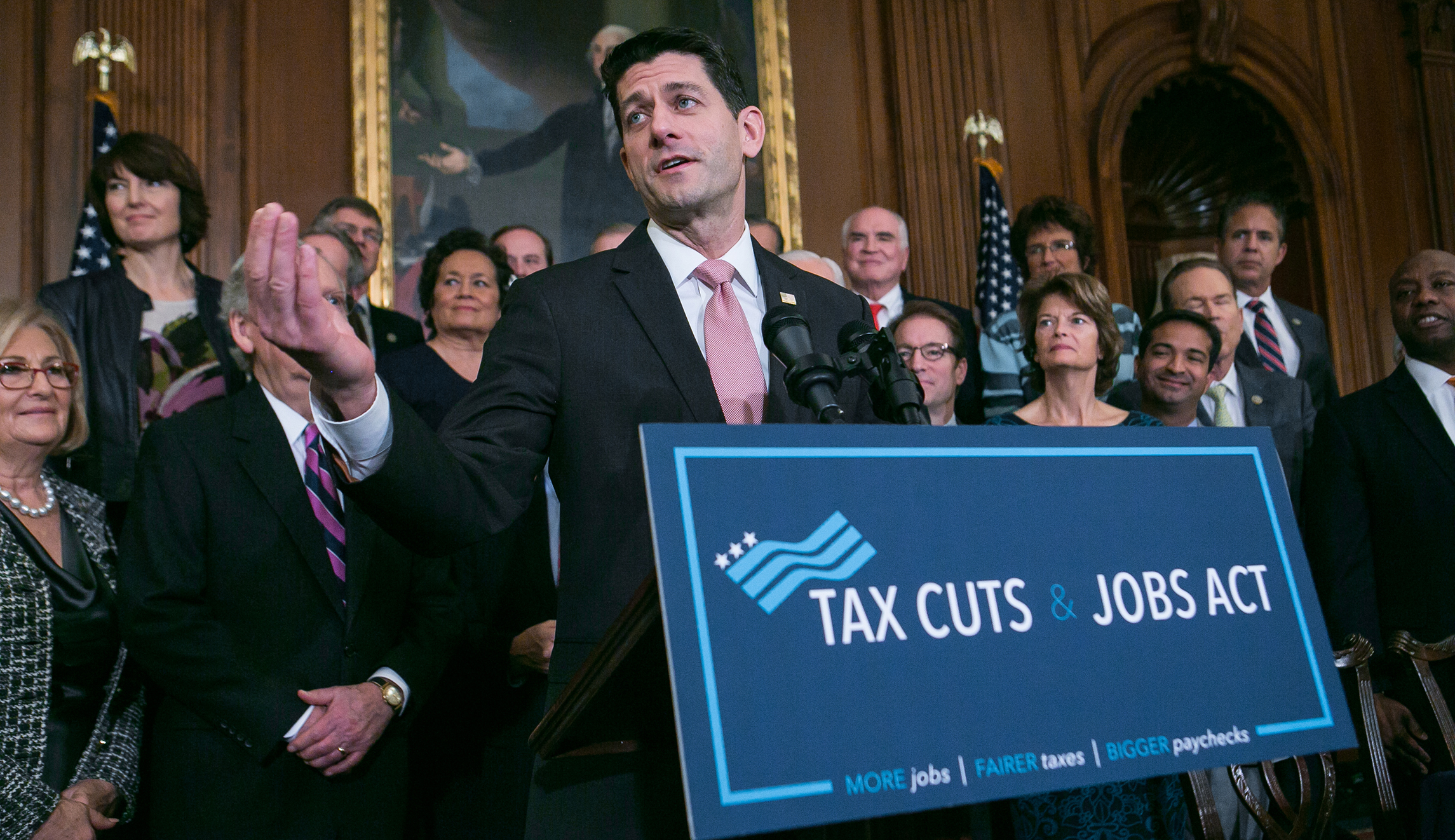 Republicans cling to tax cuts as Trump shifts to dark message on trade