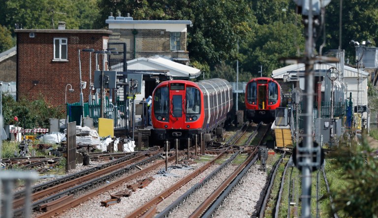 A bucket wrapped in an insulated bag caught fire on a packed London subway train Friday, sending commuters stampeding in panic at the height of the morning rush hour. (AP Photo/Frank Augstein)