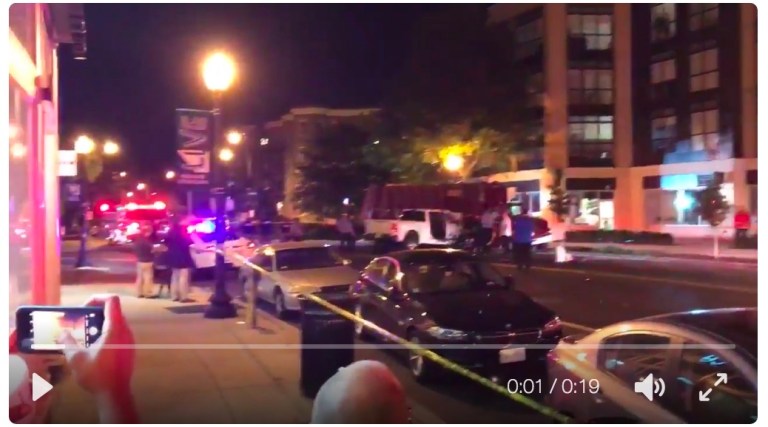 One officer is in critical condition, and the other is in serious condition. The third man's status is unknown.