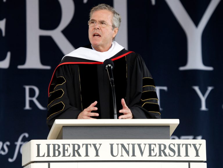 Former Florida Gov. Jeb Bush delivers the commencement address at Liberty University in Williams Stadium at the school in Lynchburg, Va., Saturday, May 9, 2015. (AP Photo/Steve Helber)