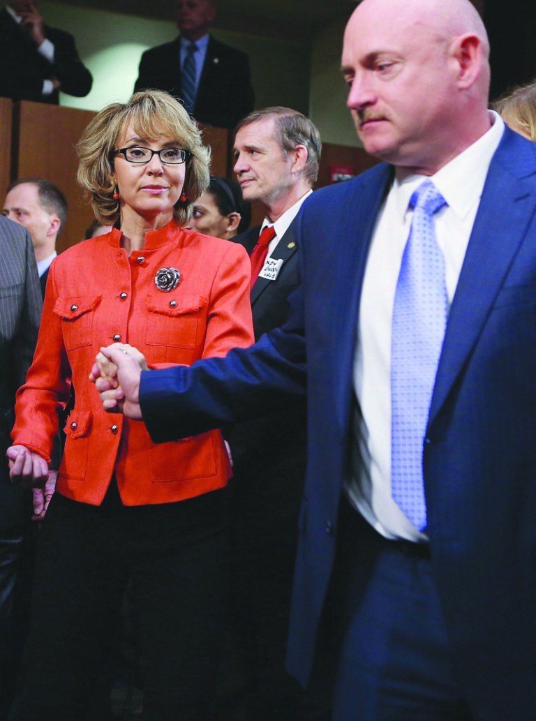 Chip Somodevilla/Getty Images
Retired NASA astronaut and Navy Capt. Mark Kelly, right, and his wife, shooting victim and former U.S. Rep. Gabby Giffords arrive for a Senate Judiciary Committee hearing on gun control on Capitol Hill on  Jan. 30.