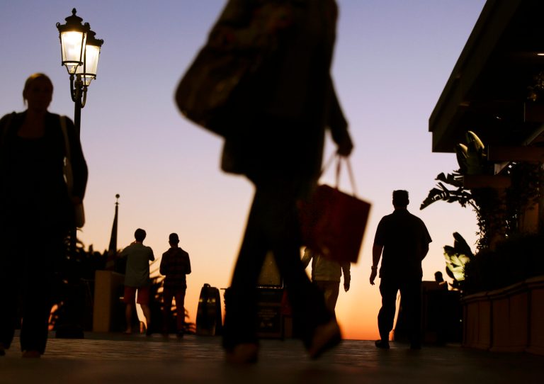   In this Thursday, Dec. 20, 2012 photo, people walk through the Fashion Island shopping center in Newport Beach, Calif. U.S. holiday retail sales this year are the weakest since 2008, after a shopping season disrupted by storms and rising uncertainty among consumers. A report out Tuesday, Dec. 25, 2012, that tracks spending, called MasterCard Advisors SpendingPulse, says holiday sales increased 0.7 percent. Analysts had expected sales to grow 3 to 4 percent. (AP Photo/Chris Carlson, File)  