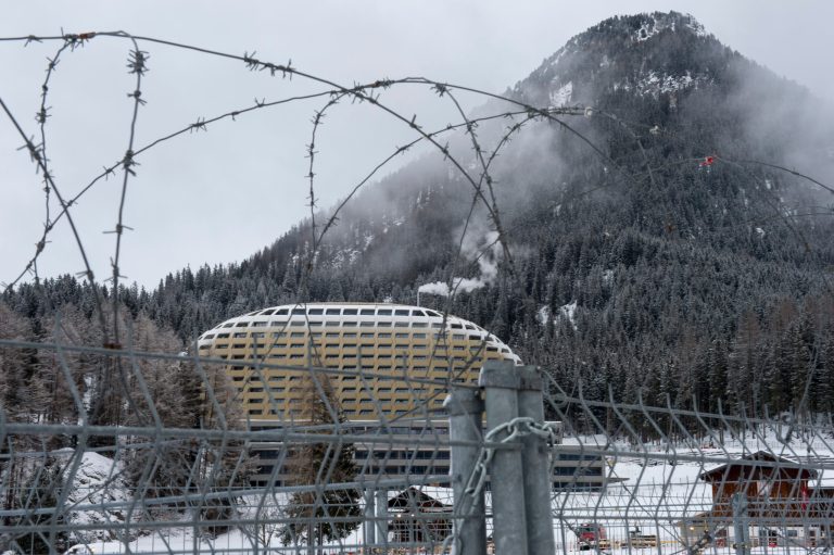The new InterContinental Hotel is pictured through the barbed wire, on the eve of the opening of the 44. annual Meeting of the World Economic Forum, WEF, in Davos, Switzerland, Tuesday, Jan.  21, 2014. The overarching theme of the Meeting, which will take place from 22 to 25 January, is 