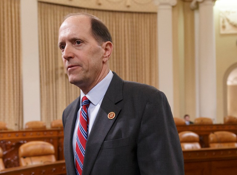 FILE - This April 9, 2014 file photo shows House Ways and Means Committee Chairman Rep. Dave Camp, R-Mich. on Capitol Hill in Washington. A House committee took a step Thursday toward keeping highway and transit aid flowing to states just three weeks before transportation programs are forecast to go broke. The Senate was expected to take action on a similar measure later in the day. The Ways and Means Committee approved by a voice vote a bill by its chairman, Rep. Dave Camp, R-Mich., that cobbles together $11 billion in pension tax changes, customs fees and money from a fund to repair leaking underground fuel storage tanks to shore up the federal Highway Trust Fund through May 2015. (AP Photo/J. Scott Applewhite, File)