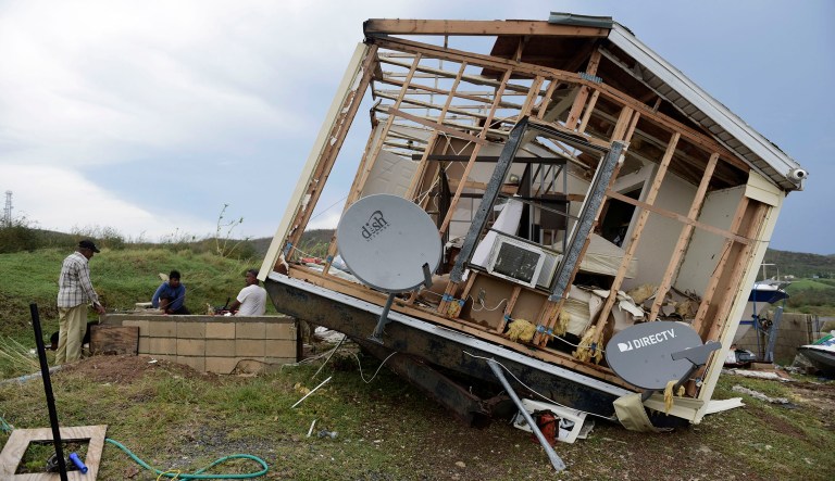 President Trump will pay a visit to Puerto Rico this month to survey the damage caused by Hurricane Irma and discuss disaster relief efforts with local leaders. (AP Photo/Carlos Giusti)