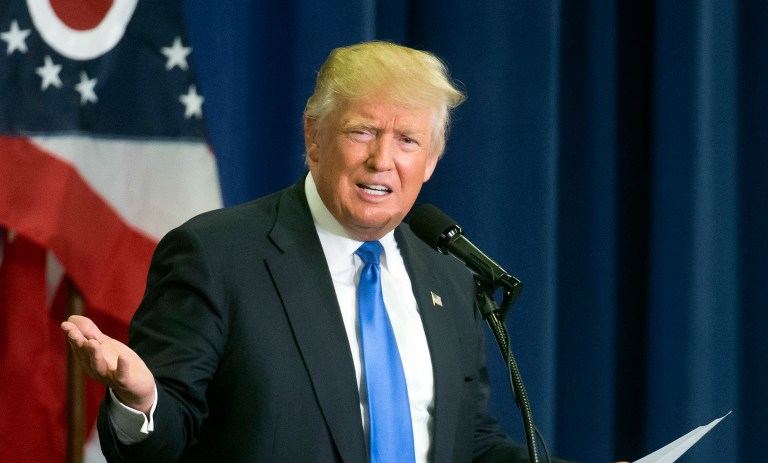 Donald Trump's campaign is slamming an analysis from a leading research firm showing his healthcare proposals would undercut insurance coverage and increase the deficit. (AP Photo/John Minchillo, File)