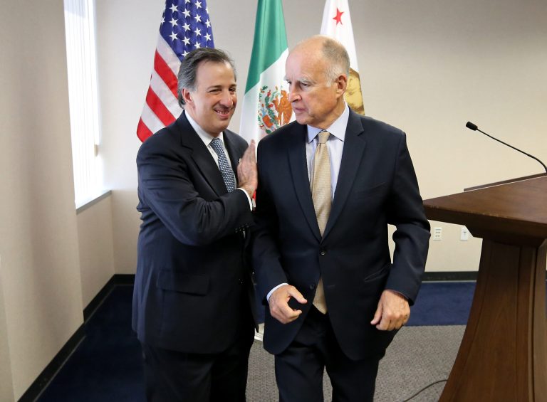 Gov. Jerry Brown, right, and Mexican Secretary of Foreign Affairs Jose Antonio Meade Kuribrena  leave a news conference after talking with reporters Wednesday, July 23, 2014, in Sacramento, Calif.  Brown and Meade attended a luncheon hosted by the California Chamber of Commerce, where they discussed Brown's upcoming visit to Mexico.(AP Photo/Rich Pedroncelli)