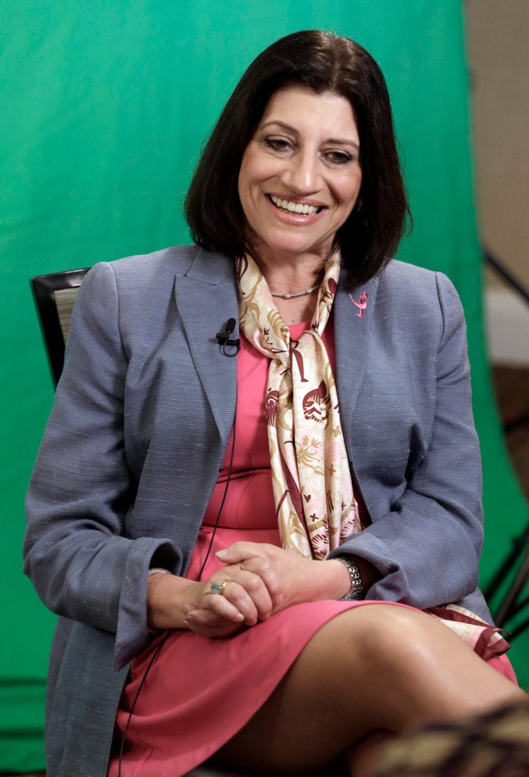 Judy Salerno smiles during an interview in Fort Worth, Texas, Friday, July 18, 2014. Salerno, a physician with a long career in health policy and research, was named the new president and CEO of  Susan G. Komen for the Cure last June. (AP Photo/LM Otero)