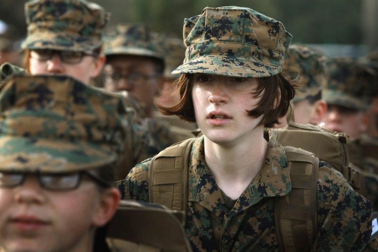 Marine Recruit Haley Evans stands in formation during boot camp Feb. 27 at MCRD Parris Island, South Carolina. Female enlisted Marines have gone through recruit training at the base since 1949. About six percent of enlisted Marines are female.ÃÂ The Marine Corps has delayed the requirement for female Marines to do three pullups because most women have so far been unable to pass the test.ÃÂ (Photo by Scott Olson/Getty images)