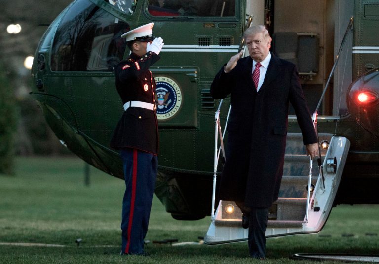 President Donald Trump salutes as he disembarks Marine One upon arrival at the White House in Washington, Sunday, March 5, 2017. (AP Photo/Manuel Balce Ceneta)