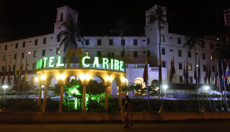 People walk past Hotel El Caribe in Cartagena, Colombia. (AP/Pedro Mendoza)