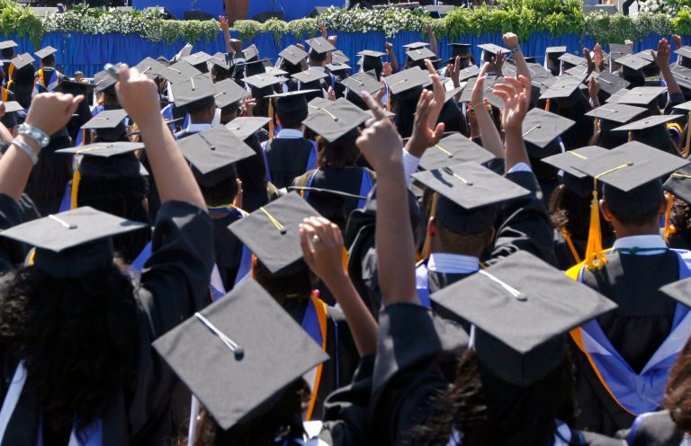 Graduates celebrate their degrees during commencement ceremonies at Hampton University in Hampton, Va., Sunday, May 9, 2010. President Barack Obama addressed the graduates at historically black university on Sunday. (AP Photo/Steve Helber)