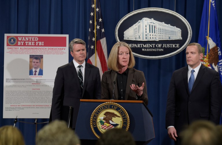 Two of the defendants, Dmitry Dokuchaev and Igor Sushchin, are officers with the Russian Federal Security Service. (AP Photo/Susan Walsh)