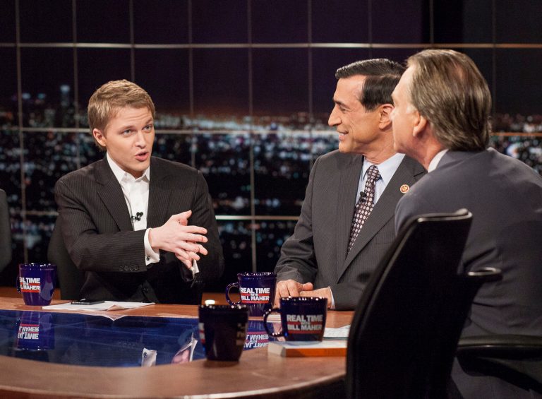 This Jan. 31, 2014 photo released by HBO shows MSNBC Host Ronan Farrow, left, speaking with Rep. Darrell Issa, R-Calif., and host Bill Maher, on 